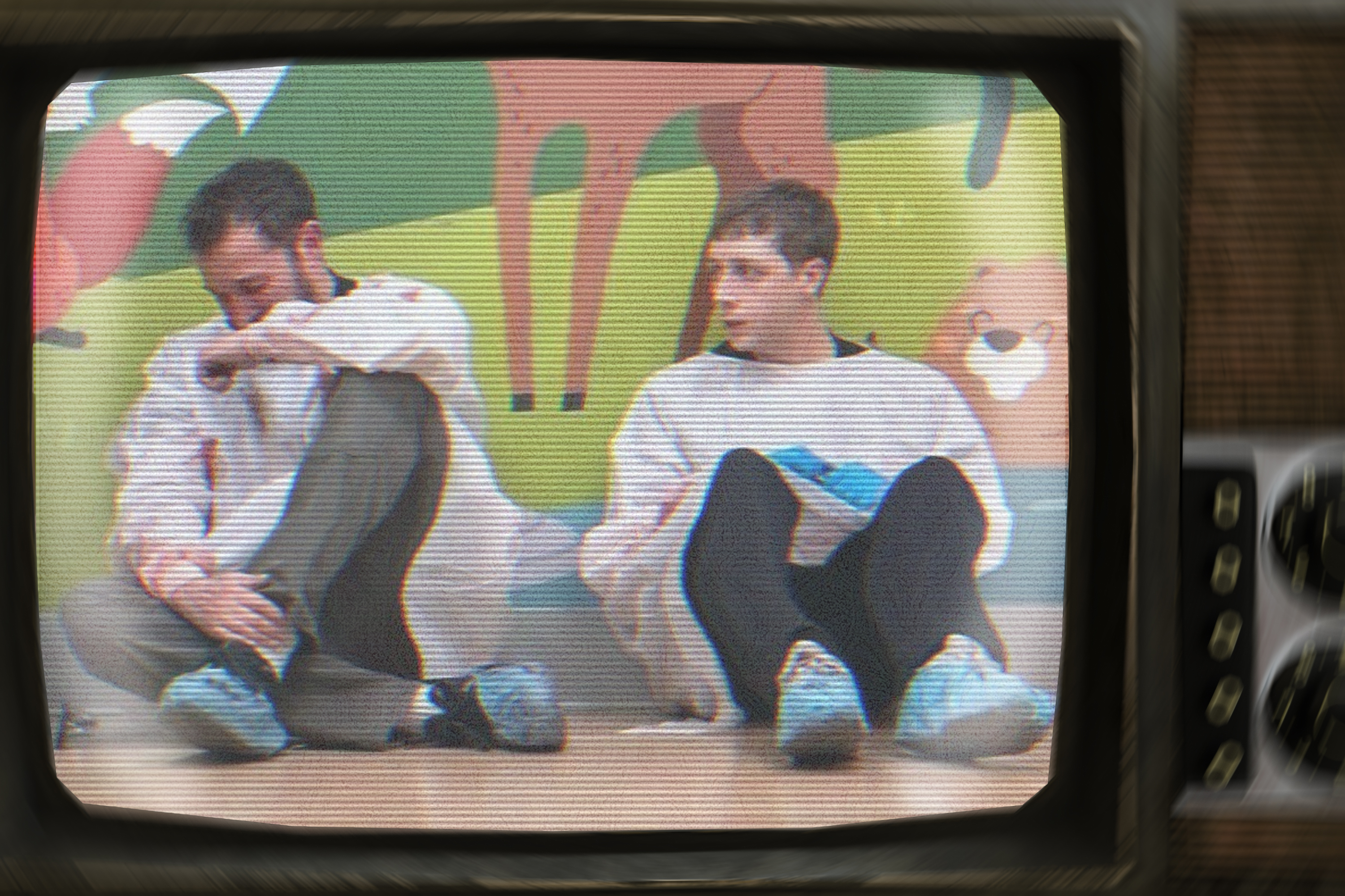 The Pitt doctors sitting against children's ward wall