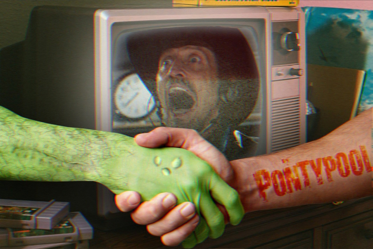Monster and man shaking hands in front of TV with PONTYPOOL on.