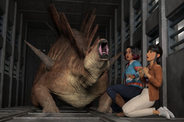 Jurassic World: Chaos Theory: Season 3. (L-R) Raini Rodriguez as Sammy Gutierrez and Kausar Mohammed as Yasmina "Yaz" Fadoula in Jurassic World: Chaos Theory: Season 3. Cr. NETFLIX © 2025