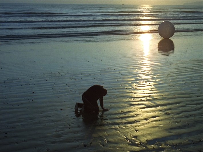 Six resigned to fate on beach with Rover in distance