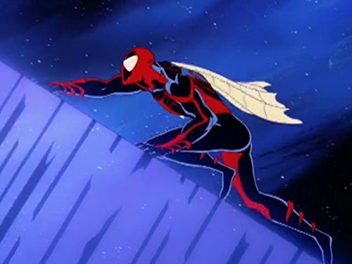 Spider-man, now in a much darker, shadowy suit, scales a building.