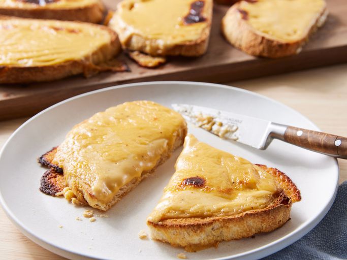 A plate of cheese-covered toast.