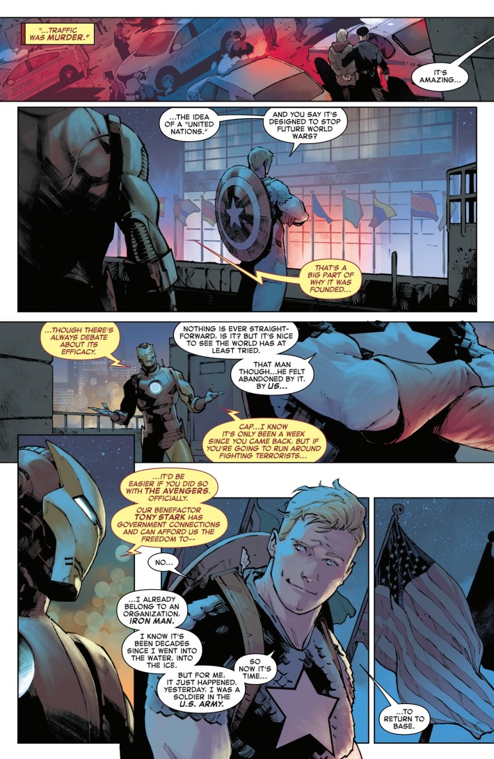 Captain America and Iron Man speak on a rooftop at night.