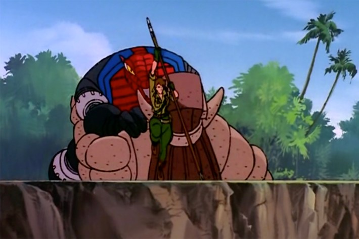 Lady Jaye pole vaulting away from wrestling kaiju