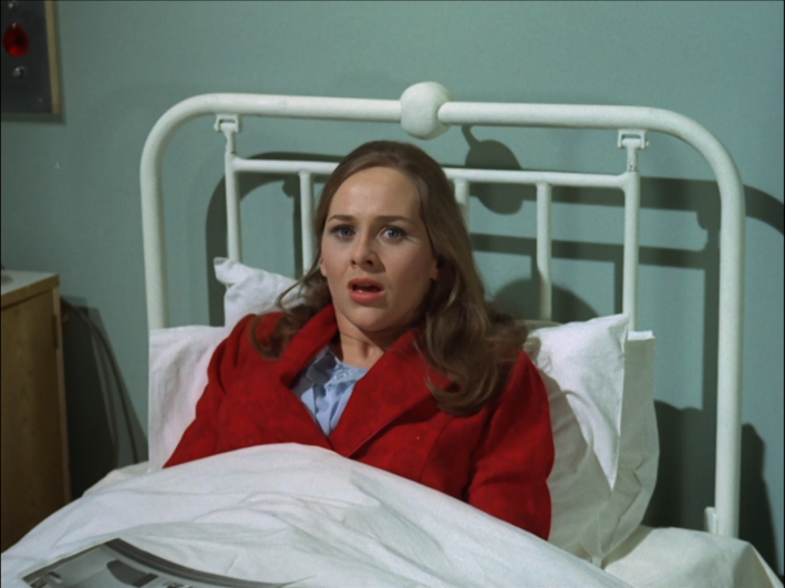 73 lies in a hospital bed looking greatly disturbed