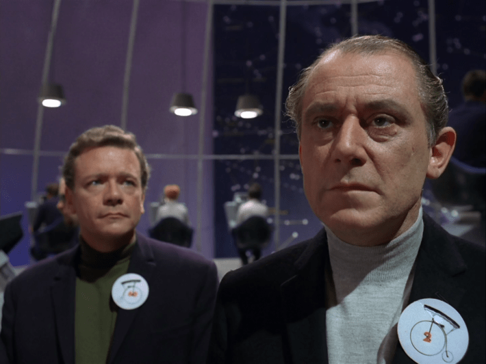Two in the foreground as Six looks on from behind