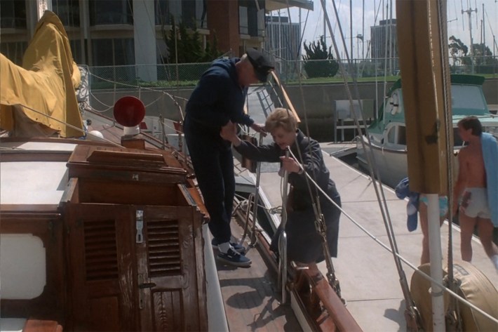 Brian Keith helping Jessica on boat