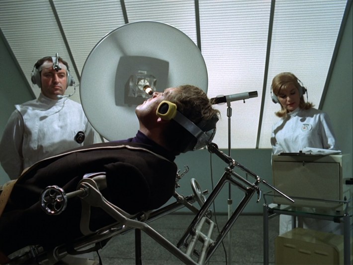Six in chair undergoing procedure