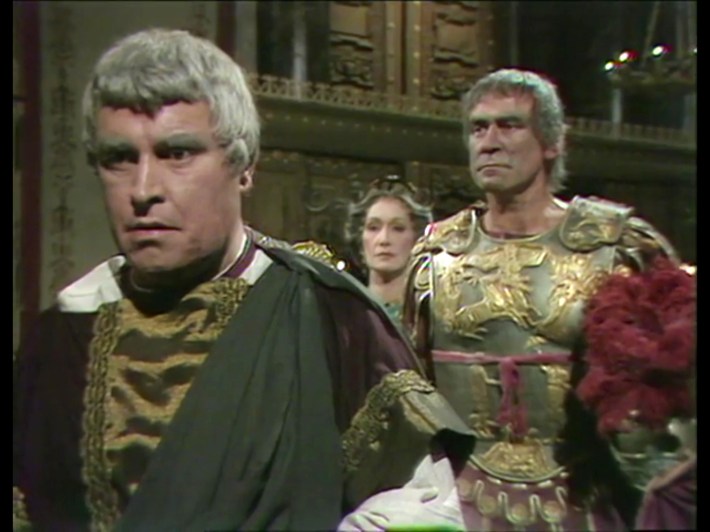 Augustus standing in front of Livia and Tiberius