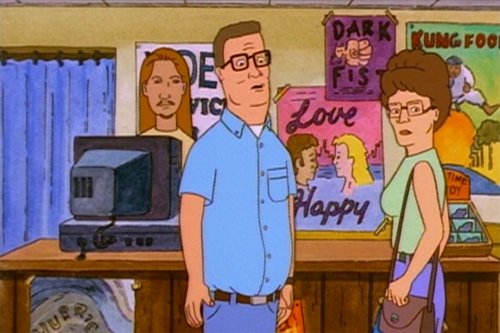 Hank and Peggy at video store checkout