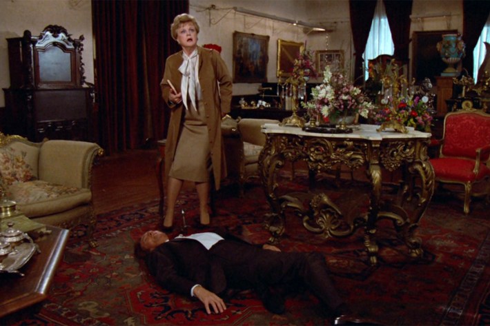 Jessica standing over dead body