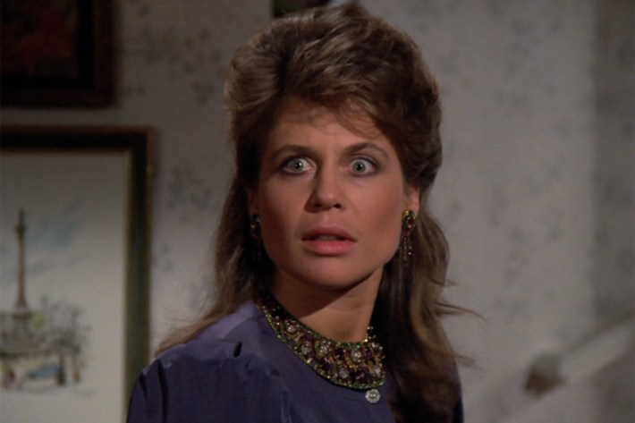 Linda Hamilton looking crazy with mullet