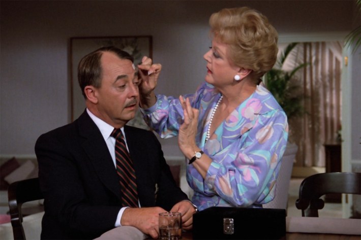 Jessica tending to Higgins' wound