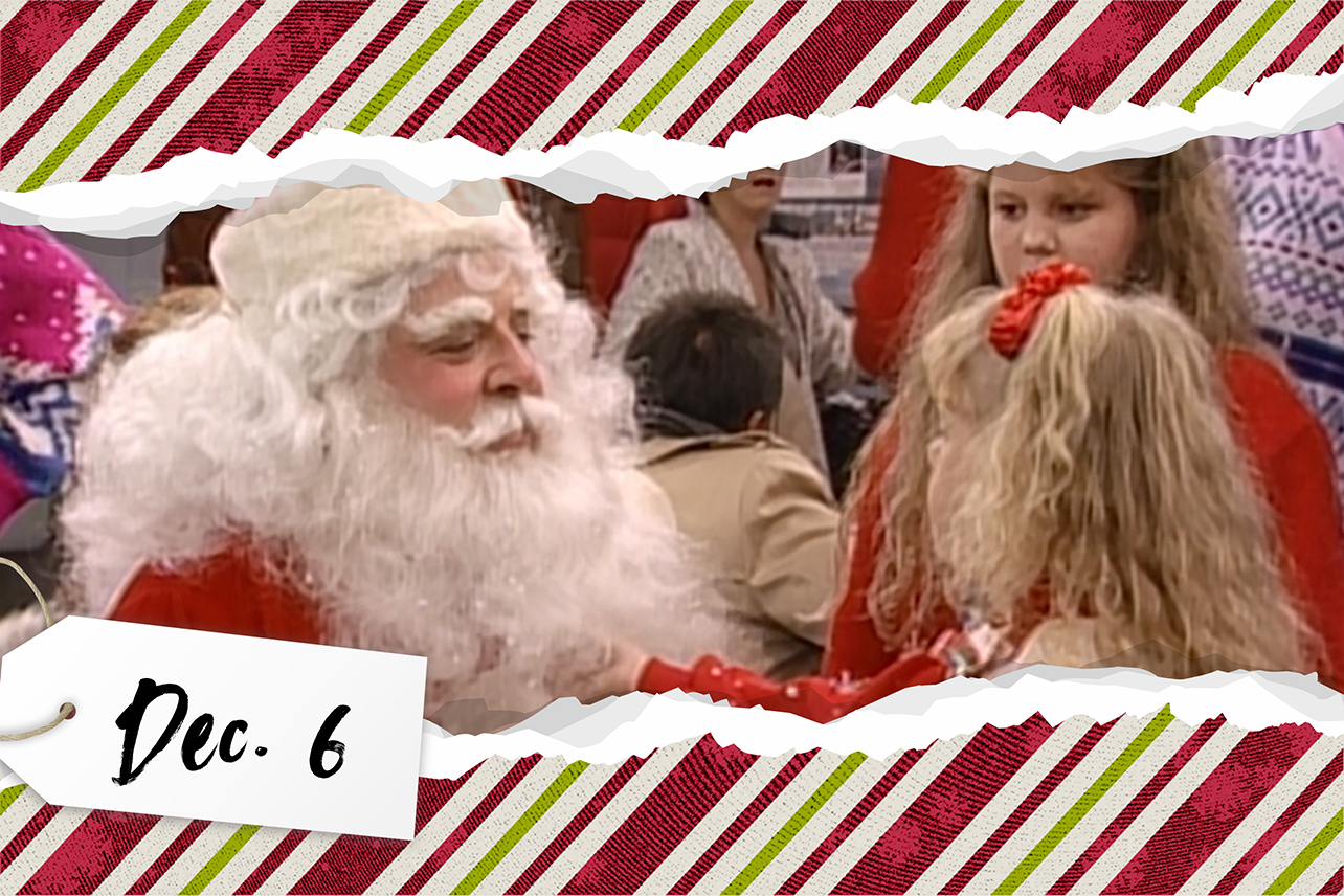 Stephanie tugging on Santa's beard