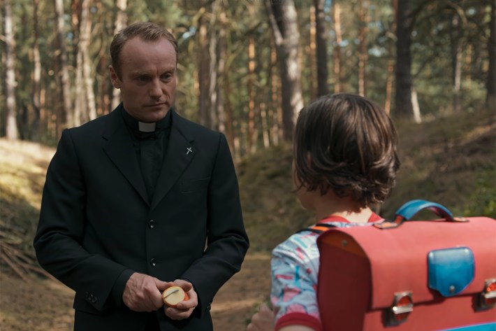 Noah in woods with Mikkel