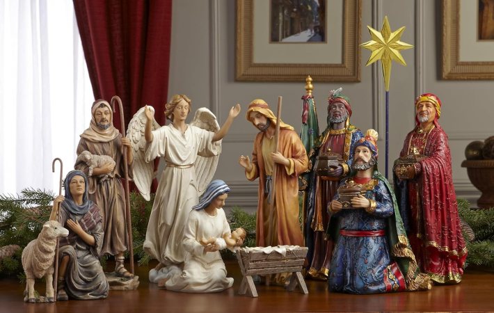 A set of small figures depicting Jesus, Mary, Joseph, an angel, the wise men, shepherds, and a sheep.