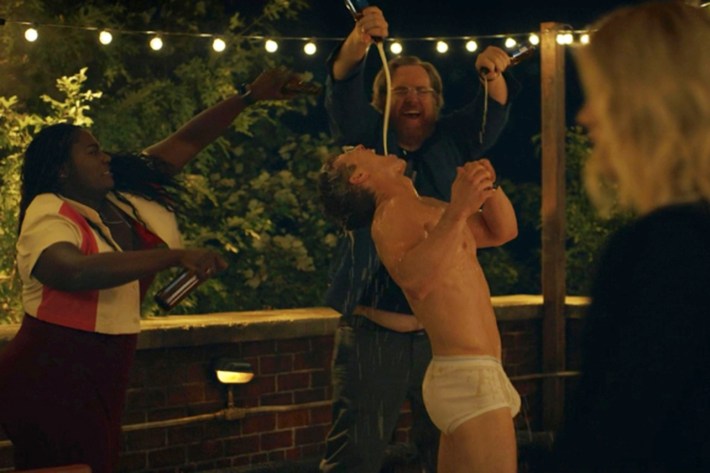 Vigilante being doused in champagne