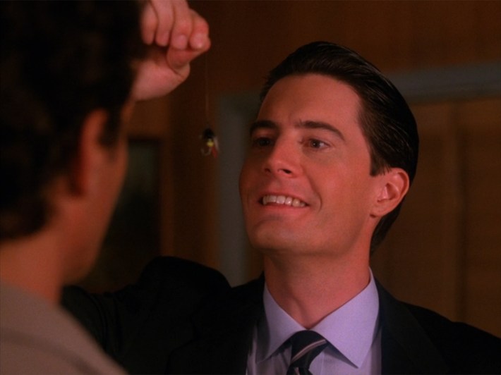 Cooper holding fishing lure