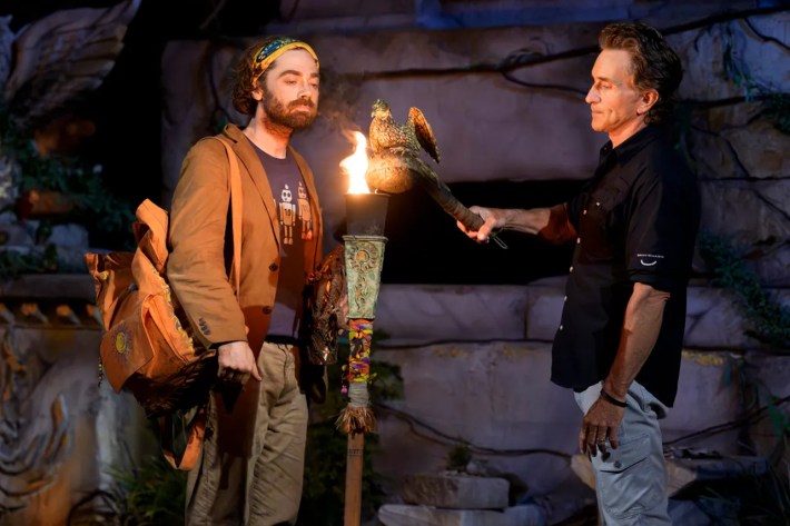 Jeff snuffing Christian's torch