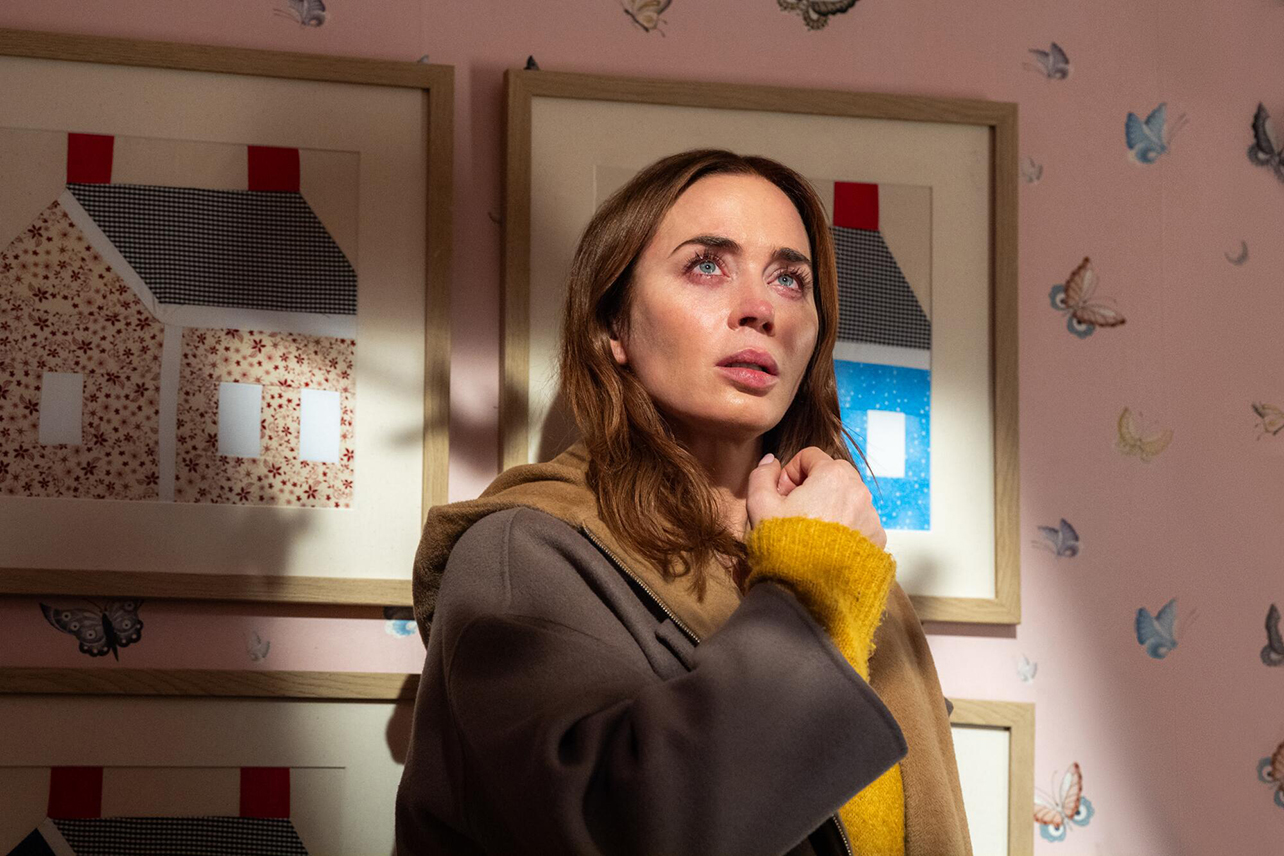 Emily Blunt looking tearfully