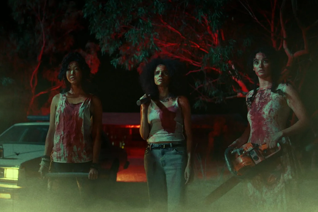 Three women with weapons