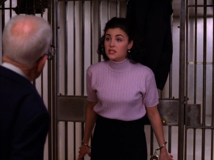Audrey handcuffed in bank