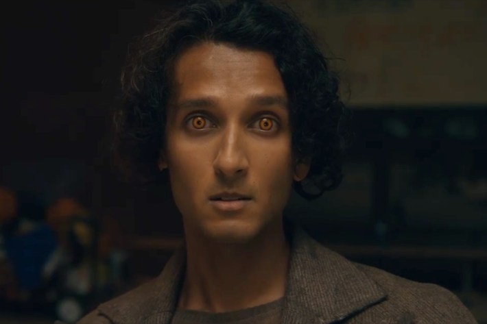 Armand staring into camera