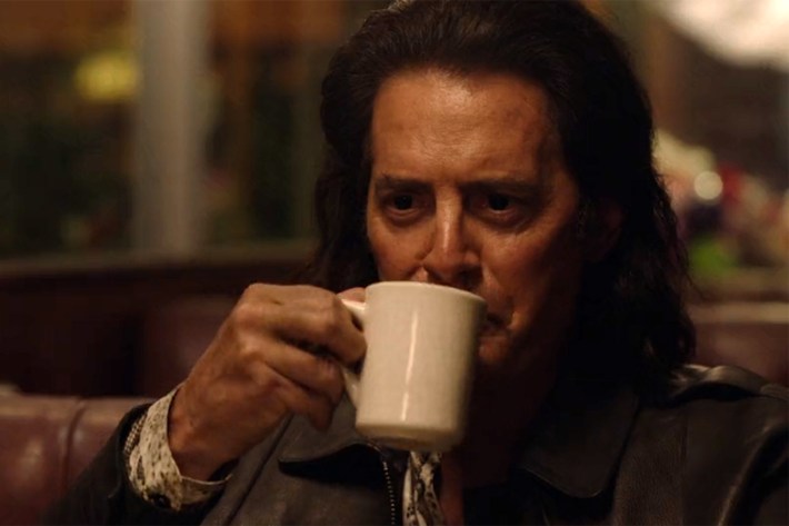Cooper doppelganger drinking coffee