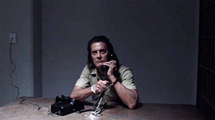 Evil Coop on phone