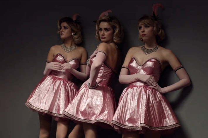 Trio of women in cocktail dresses