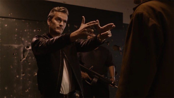 Red with finger guns