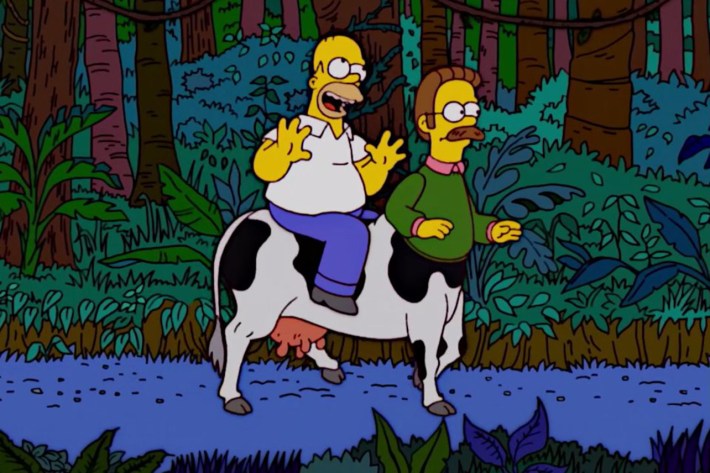 Homer riding Ned cow