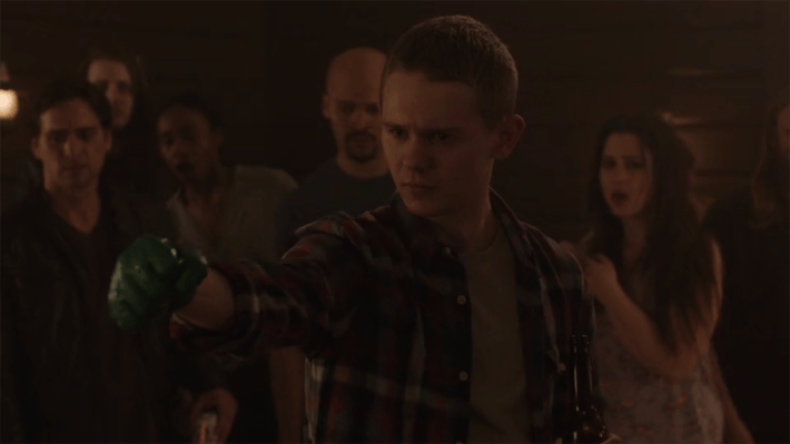 Man with green hand